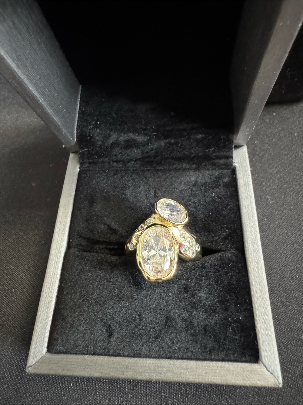 Elegant 925 GoldTone Statement Ring w/ 2 Sparkling Oval CZ and CZ side accents.